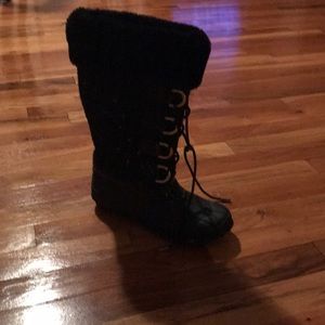 Black and gold boots